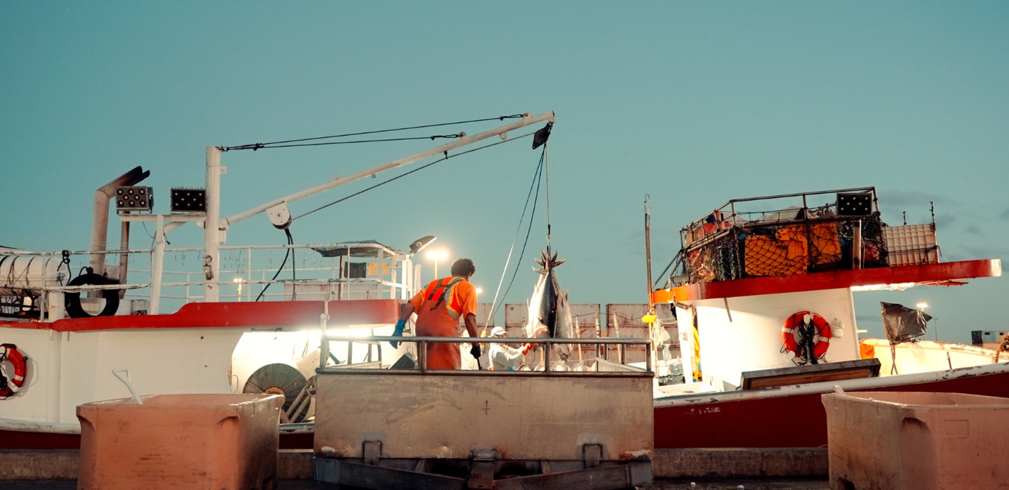 Fishing vessels at the Honolulu harbor before dawn