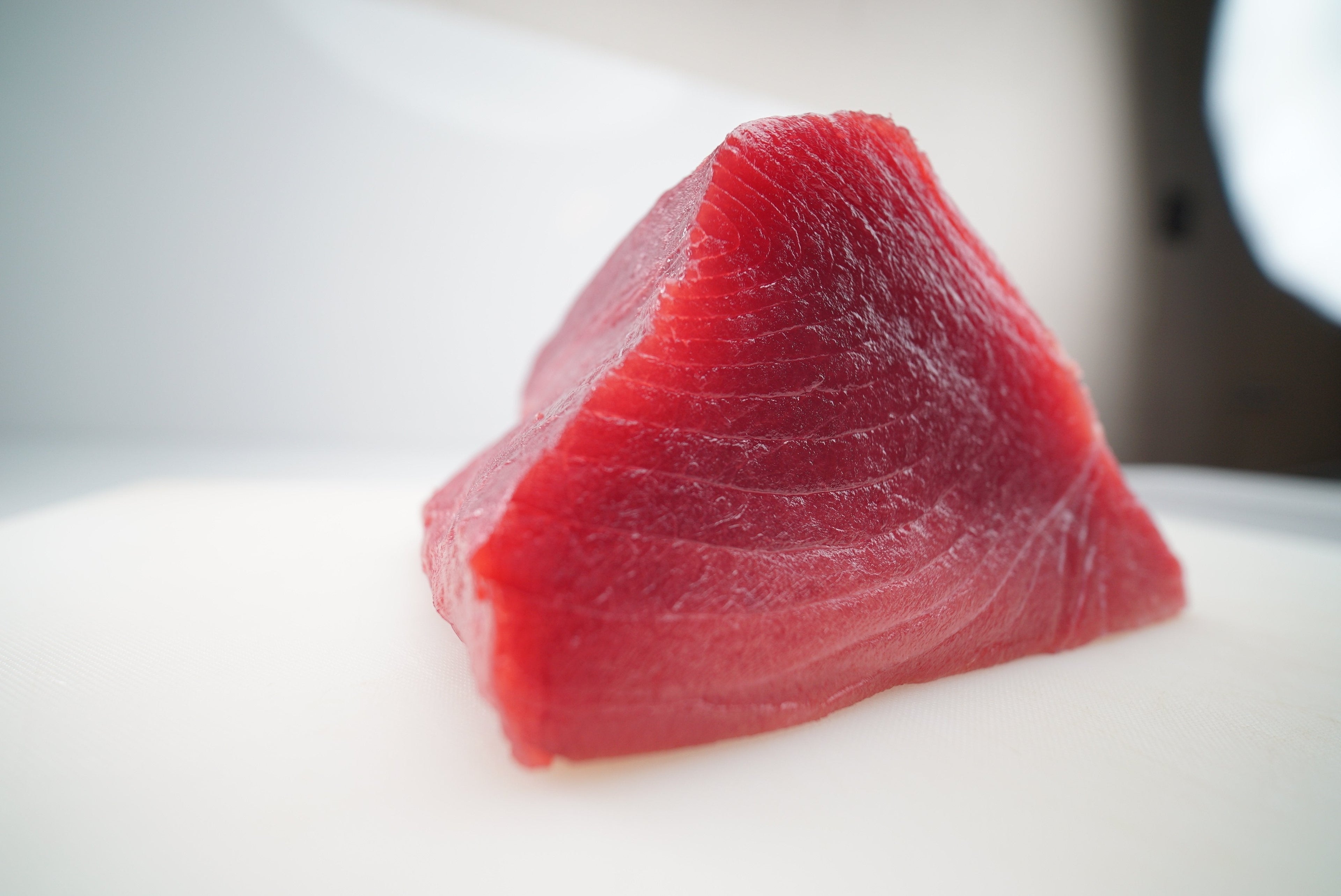 Hawaiian bigeye ahi bright red sashimi cut, The Ahi Club